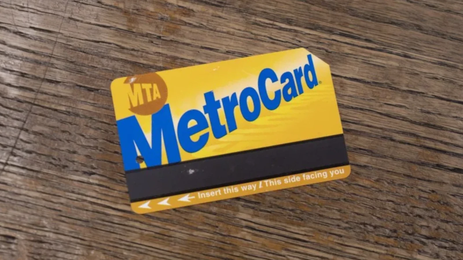 Hideously garish in its blue and yellow splendour with a clipped corner like an expired passport.